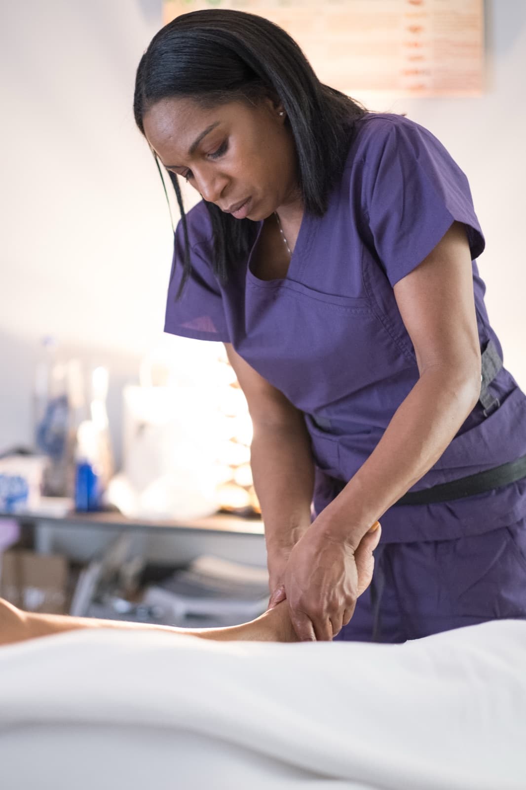 Kiondra Watson, founder and licensed massage therapist, at work